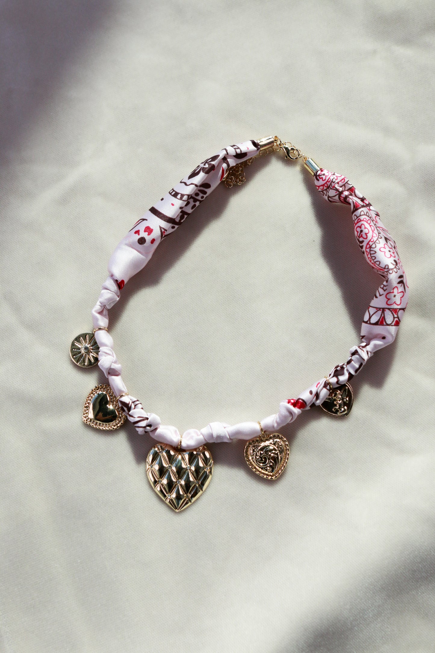 Pink Scarf with Heart Charms