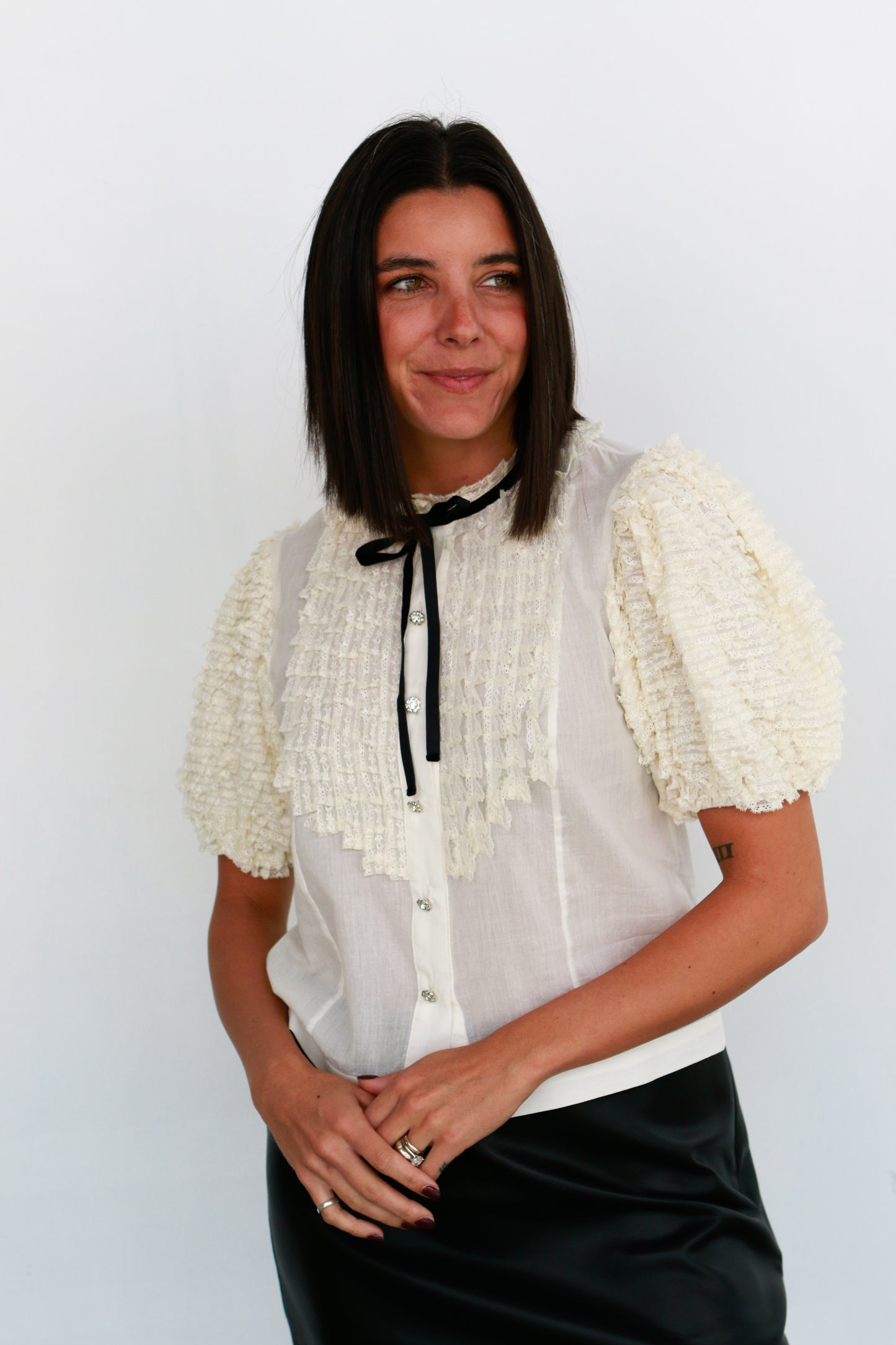 love the label oceane cream blouse with ruffles and crystal buttons 