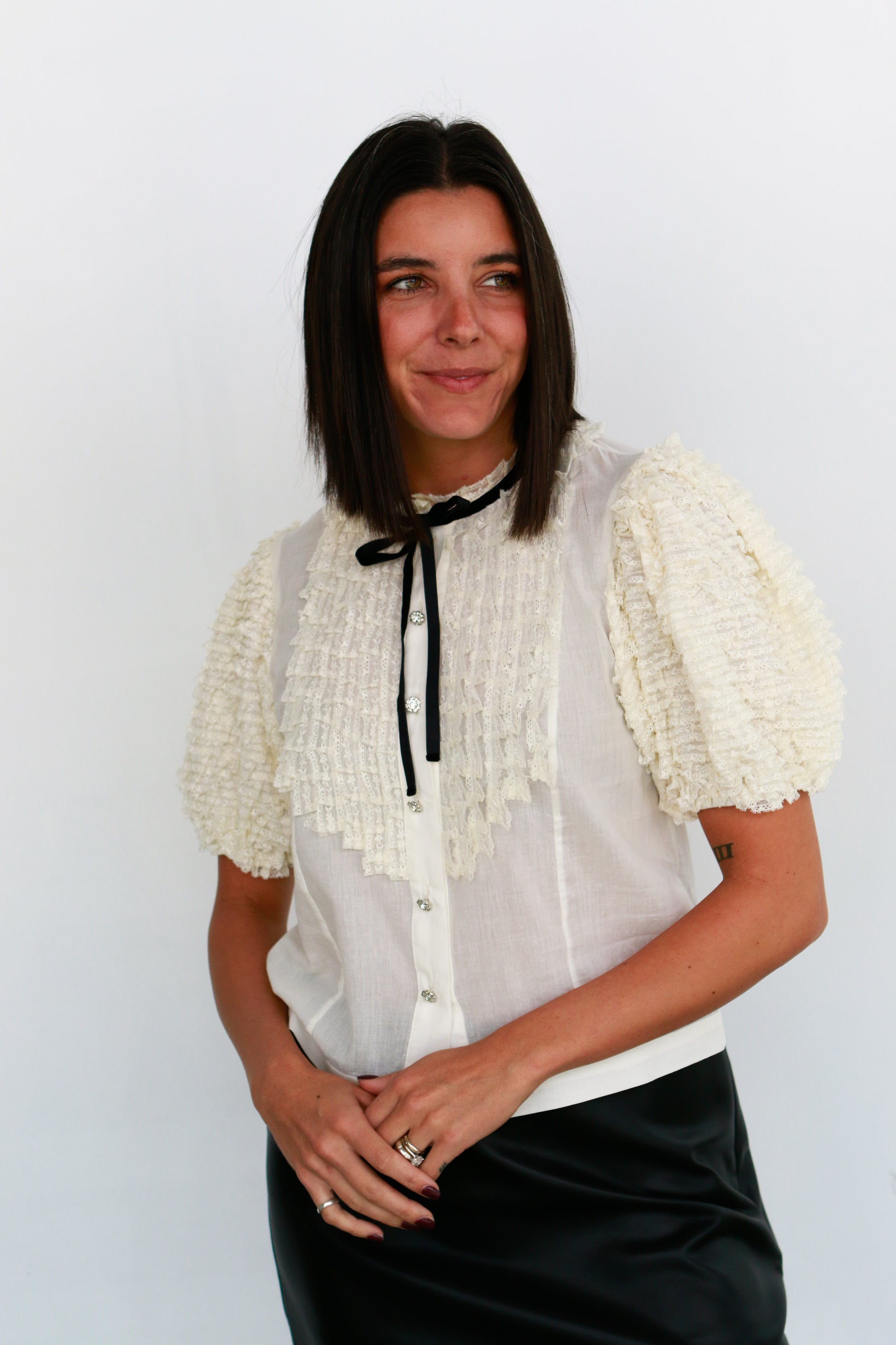 love the label oceane cream blouse with ruffles and crystal buttons 
