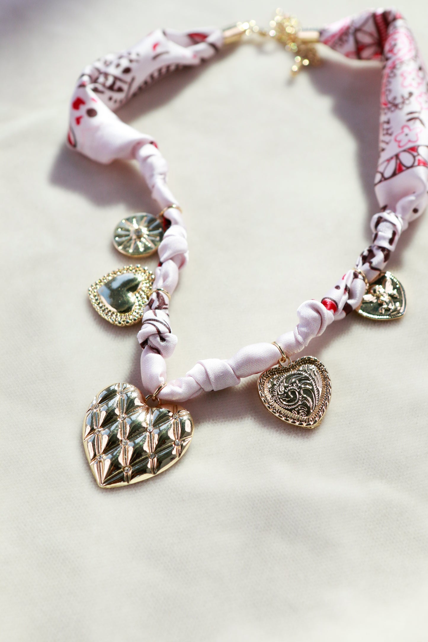 Pink Scarf with Heart Charms