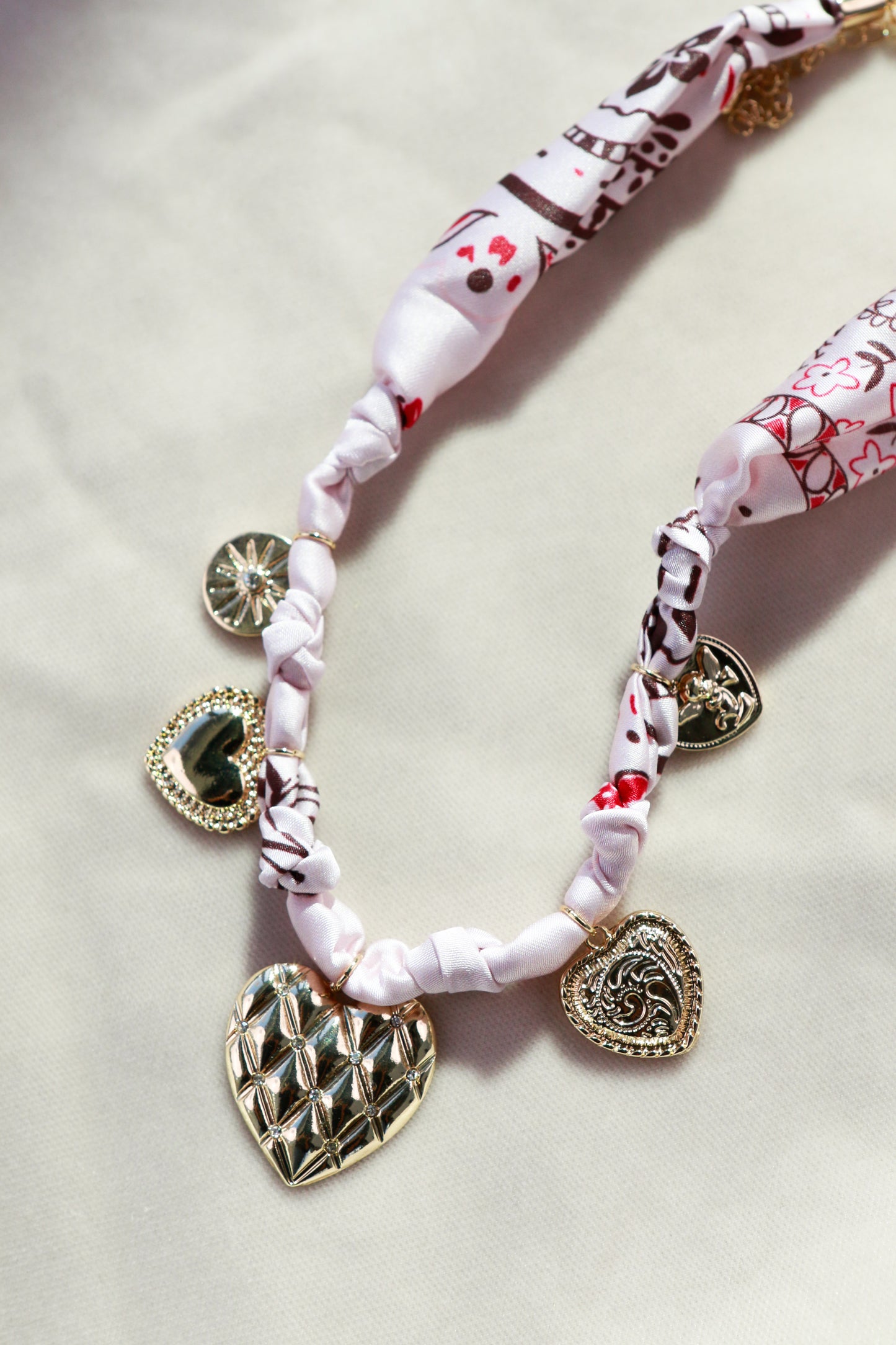 Pink Scarf with Heart Charms