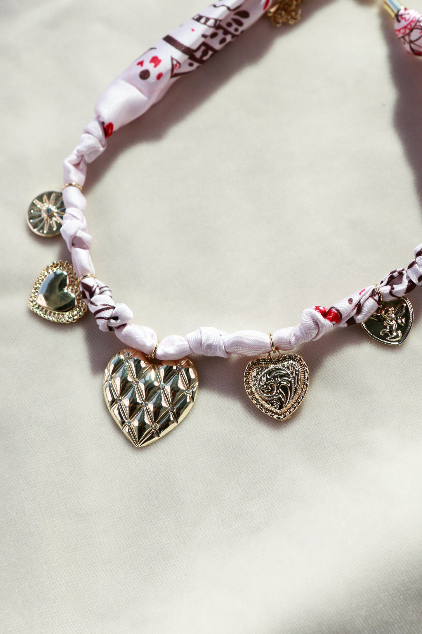 Pink Scarf with Heart Charms