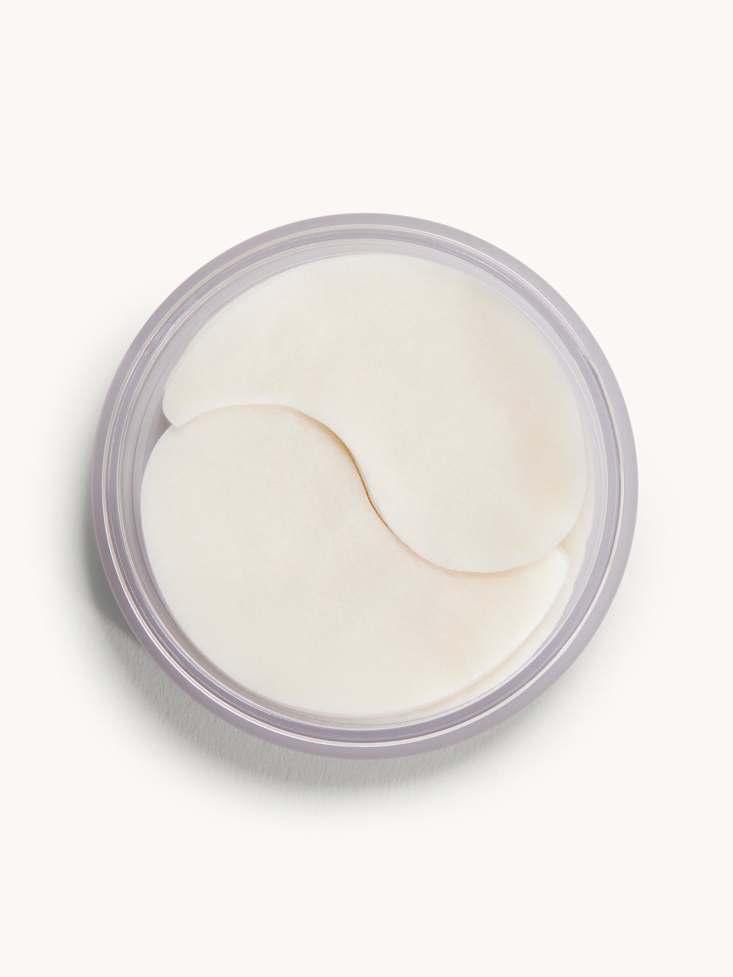 Jar of eye patches on a white background